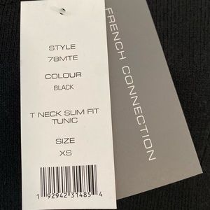 Black turtle neck T neck slim tunic. Soft and delicate and brand new condition.